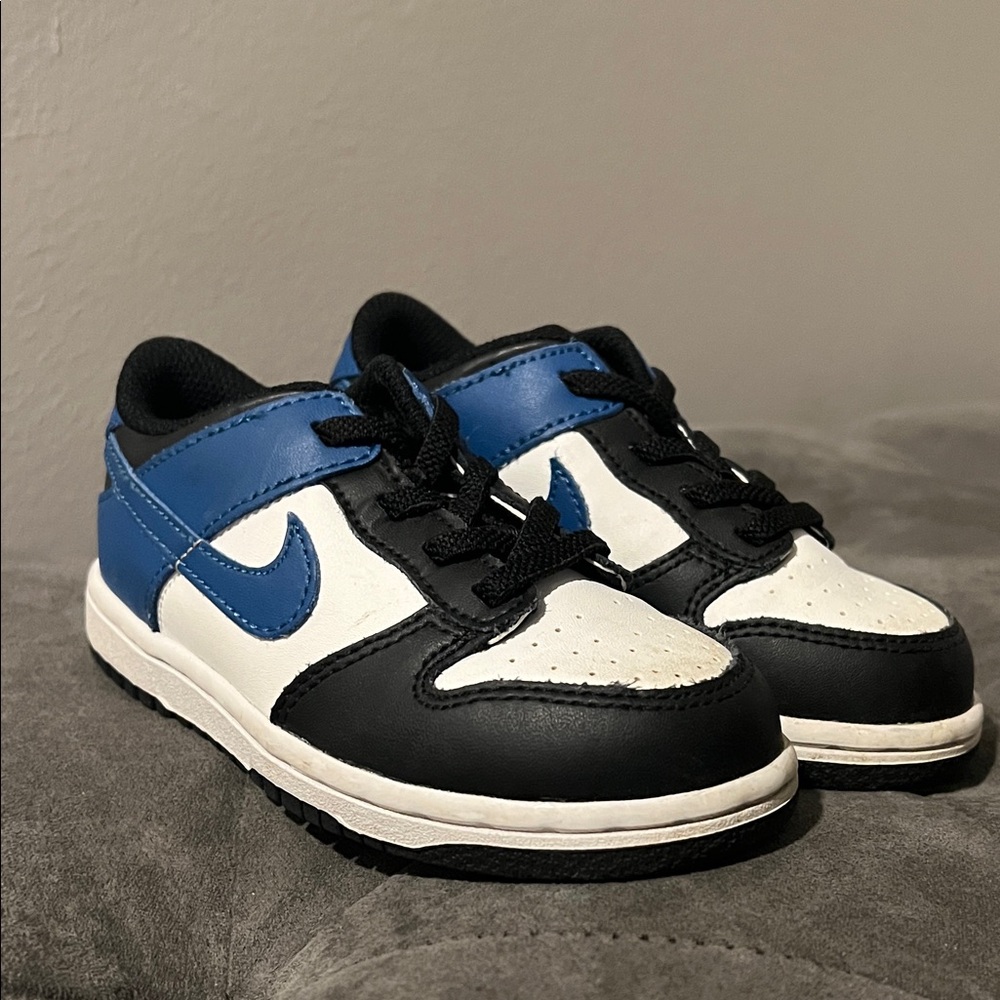 Nike Kids' Black and White Sneakers with Blue Accents